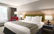 Bedroom 4 Country Inn & Suites by Radisson, Novi, MI