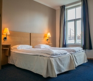 Kamar Tidur 3 City Living Schøller Hotel