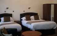 Kamar Tidur 5 McLays Guest House