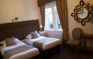 Kamar Tidur 4 McLays Guest House