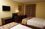 Bedroom 5 Days Inn & Suites by Wyndham Harvey / Chicago Southland