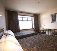 Bedroom 4 Distinction Coachman Hotel, Palmerston North