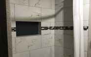 In-room Bathroom 3 Super 8 by Wyndham Childress