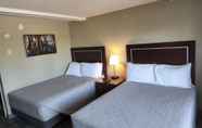 Kamar Tidur 7 Queen City Inn