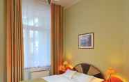 Kamar Tidur 7 Baross City Hotel