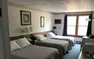 Bedroom 5 Lake Ontario Motel & Inn
