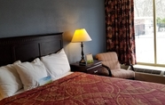 ห้องนอน 7 Days Inn by Wyndham Lexington
