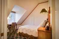 Kamar Tidur Campbell House Inn