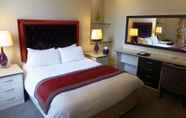 Kamar Tidur 6 The Riverside House Hotel