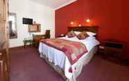 Kamar Tidur 4 The Bull Hotel