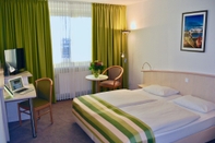 Bedroom Panorama Inn Hotel und Boardinghaus