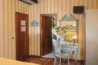 ห้องนอน Hotel Tintoretto