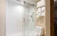In-room Bathroom 3 Country Inn & Suites by Radisson, Grandville-Grand Rapids West, MI