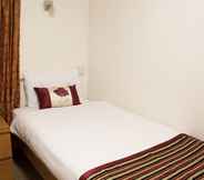 Kamar Tidur 5 Abbey Court, Hyde Park Hotels