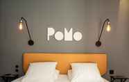 ห้องนอน 7 PoMo Hotel & Restaurant