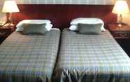 Kamar Tidur 3 The Royal Hotel