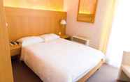 Bedroom 4 Hotel DU LAC Locarno