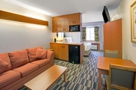 ห้องนอน Microtel Inn & Suites by Wyndham Cherokee