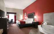 Bedroom 6 Days Inn & Suites by Wyndham Murfreesboro