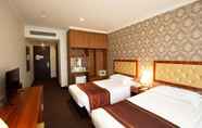 Kamar Tidur 4 Magnificent International Hotel