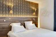 ห้องนอน Hotel Carladez Cambronne