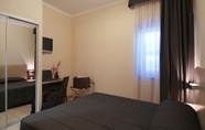 Bedroom 7 E H SUITES ROME AIRPORT