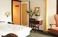 ห้องนอน 6 Athmos Hotel