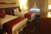 Kamar Tidur Bedfort Inn & Suites