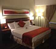 Kamar Tidur 4 Bedfort Inn & Suites