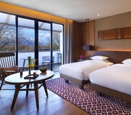 Bedroom 2 Jinmao Hotel Lijiang, the Unbound Collection by Hyatt