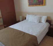 Bedroom 2 El Regio Hotel