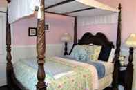 Bedroom The Olde Mill Inn Bed & Breakfast