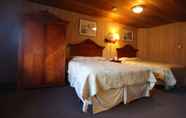 Bilik Tidur 3 Swiss Chalets Motel