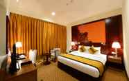 Kamar Tidur 4 Landmark Premier Hotel