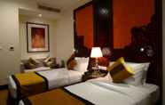 Kamar Tidur 7 Landmark Premier Hotel