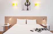 Bedroom 5 Aparthotel Adagio Access Paris Massy Gare TGV