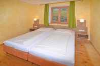 Bedroom Landhotel Maiergschwendt by DEVA