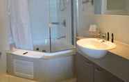 In-room Bathroom 6 BASE Holidays - Ettalong Beach Premium Apartments