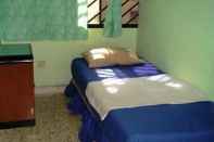 Kamar Tidur Step Inn Guest House