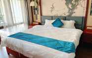 Kamar Tidur 4 Ramada by Wyndham Wanning Resort