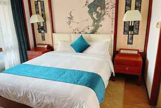 Kamar Tidur 4 Ramada by Wyndham Wanning Resort