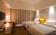 Kamar Tidur 3 Metropolo Ningde Wanda Plaza Hotel