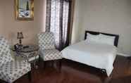 Kamar Tidur 5 Mac Bed and Breakfast