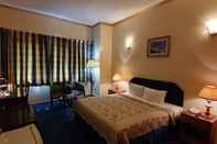 Kamar Tidur Kings Square Hotel