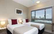 ห้องนอน 7 Darwin Executive Suites