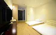 Kamar Tidur 7 Hotel Graytone Dunsan