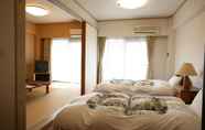 Kamar Tidur 3 Condominium Hotel Garland Court Usami