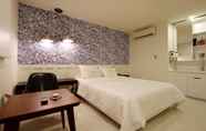 Kamar Tidur 7 Bando Tourism Hotel