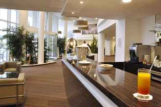 Sảnh chờ 4 Golden Tulip Nantes Carquefou Suites