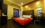 Bilik Tidur 7 Hotel Pearl Inn & Suites